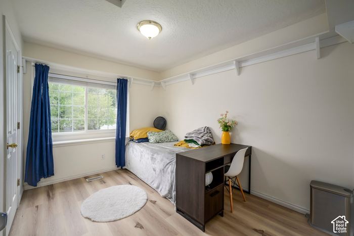 Bedroom with a large window